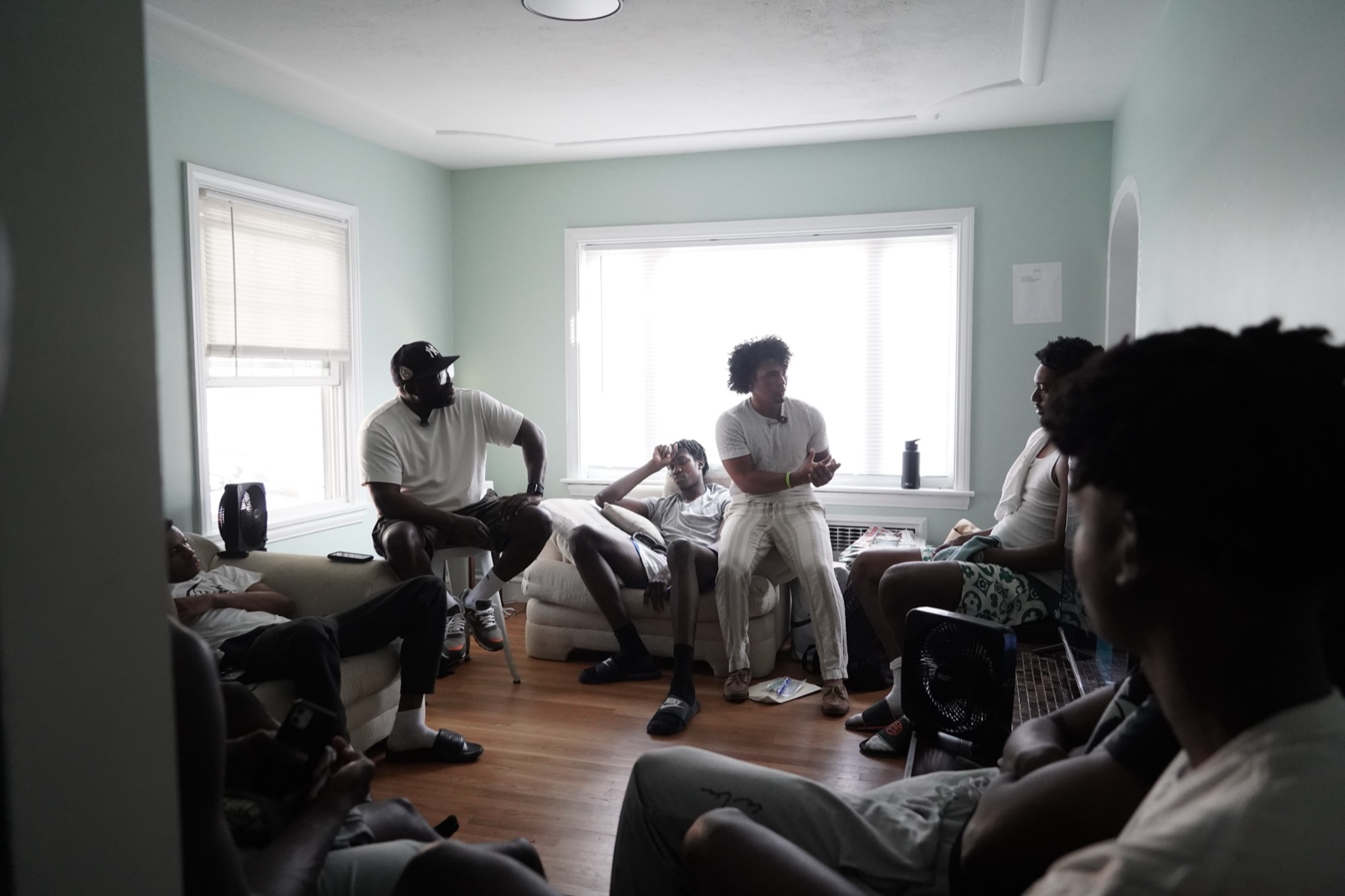 A group of young men in conversation